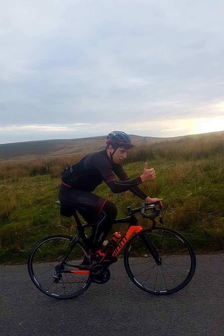 Jack sticks a thumbs up for a photo